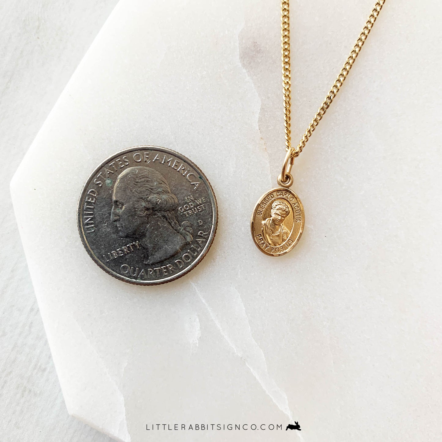 14kt gold filled Saint Carlo Acutis tiny medal necklace on white background — made in the USA