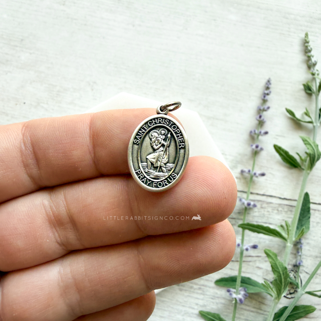 Sterling silver Saint Christopher medal necklace on white background — heirloom Catholic jewelry handmade in the USA
